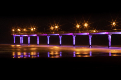 New Brighton Pier lit up purple